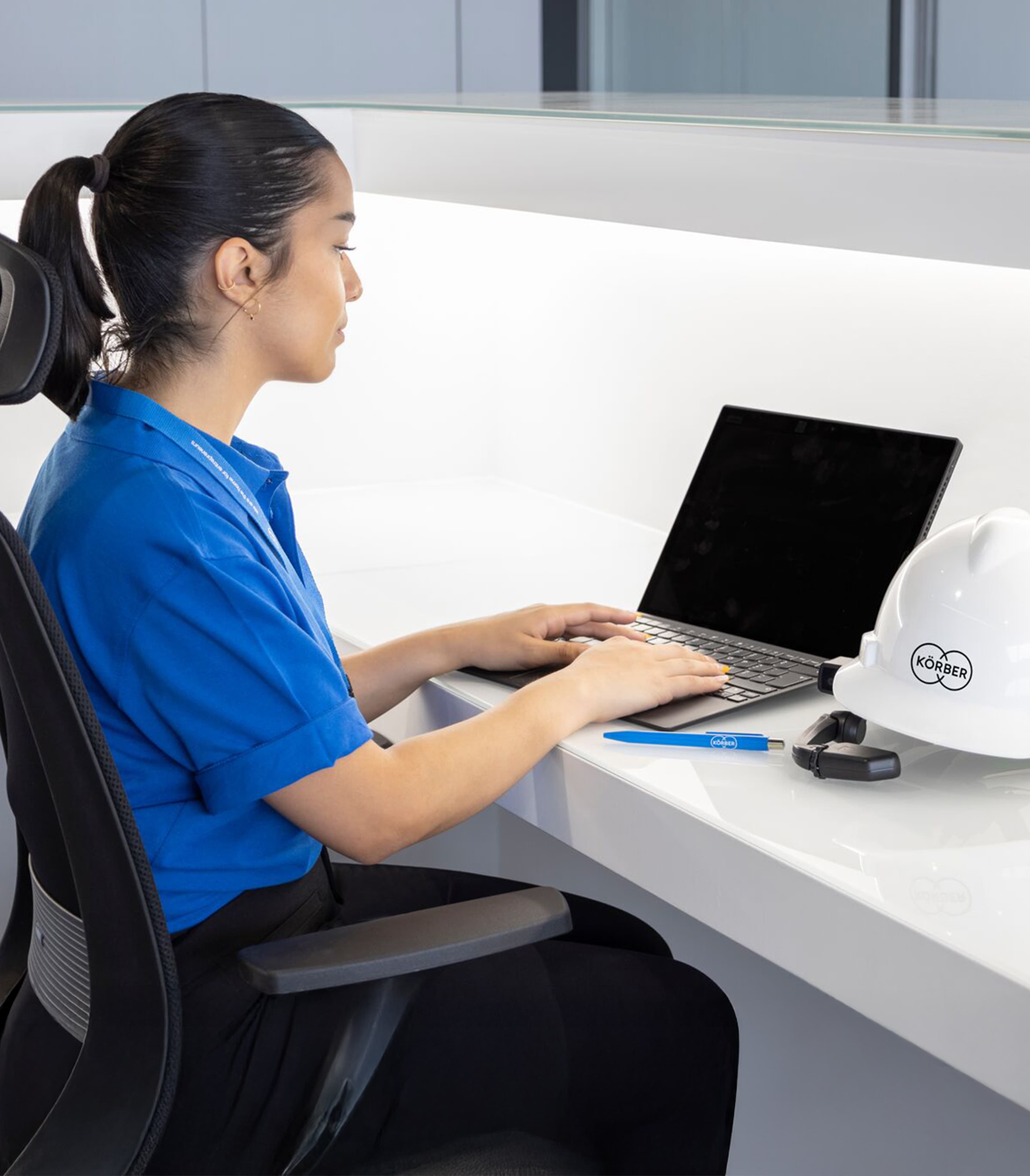 Woman sitting at a laptop