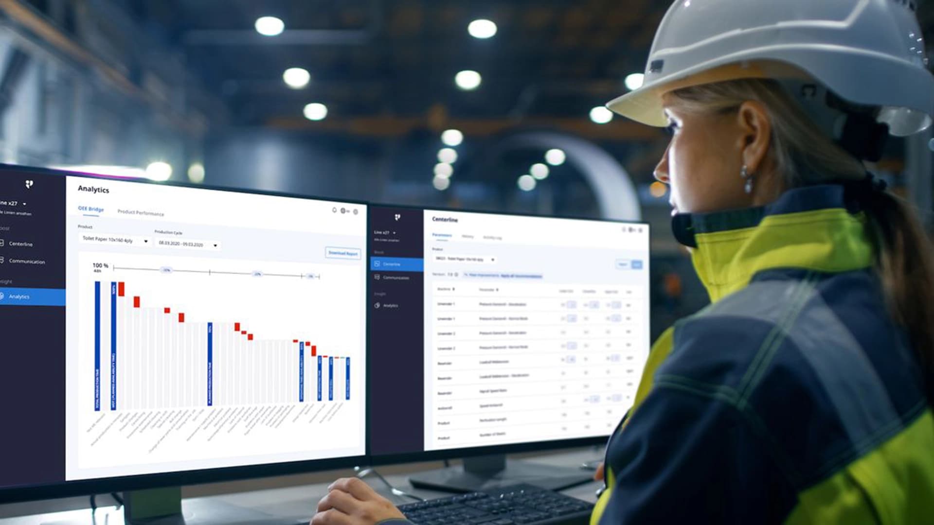 Woman analyzing MES data on a desktop computer.