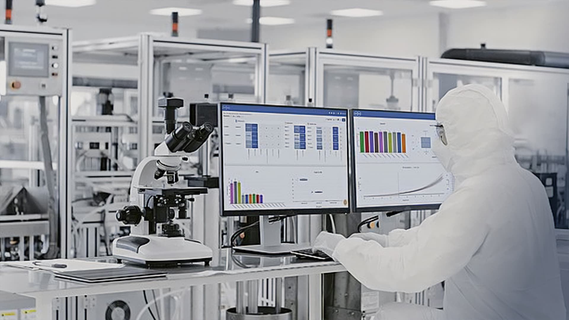 Lab technician using software on a desktop computer